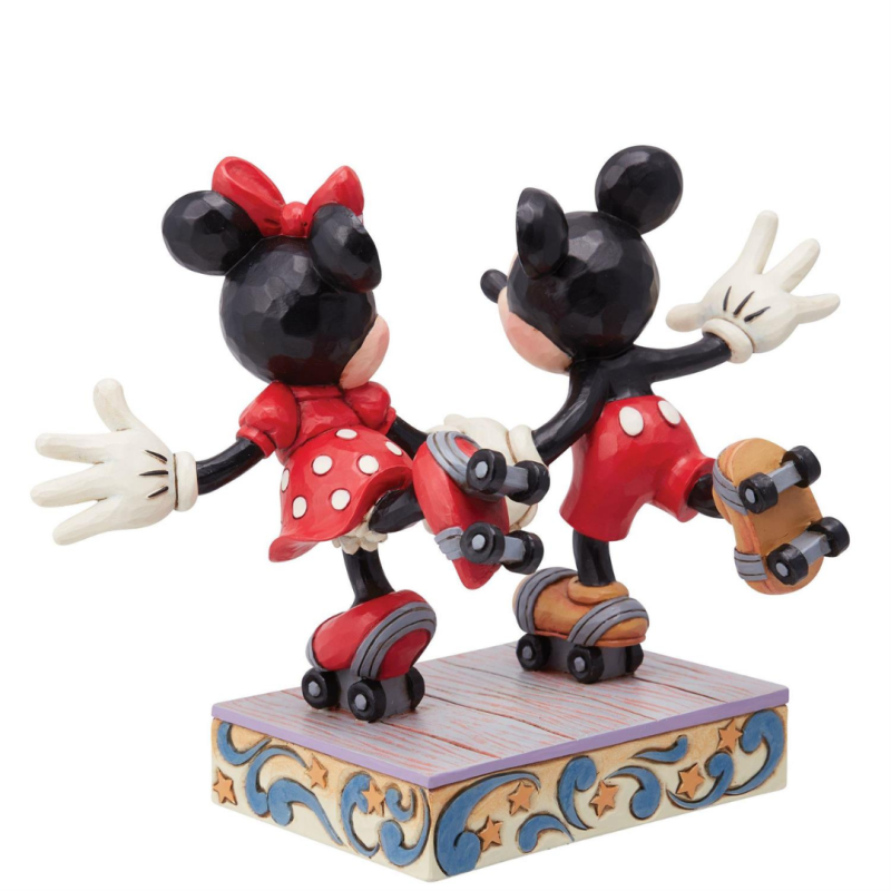 Figurine Mickey et Minnie font du roller Disney traditions 6014315