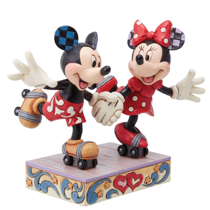Figurine Mickey et Minnie font du roller Disney traditions 6014315