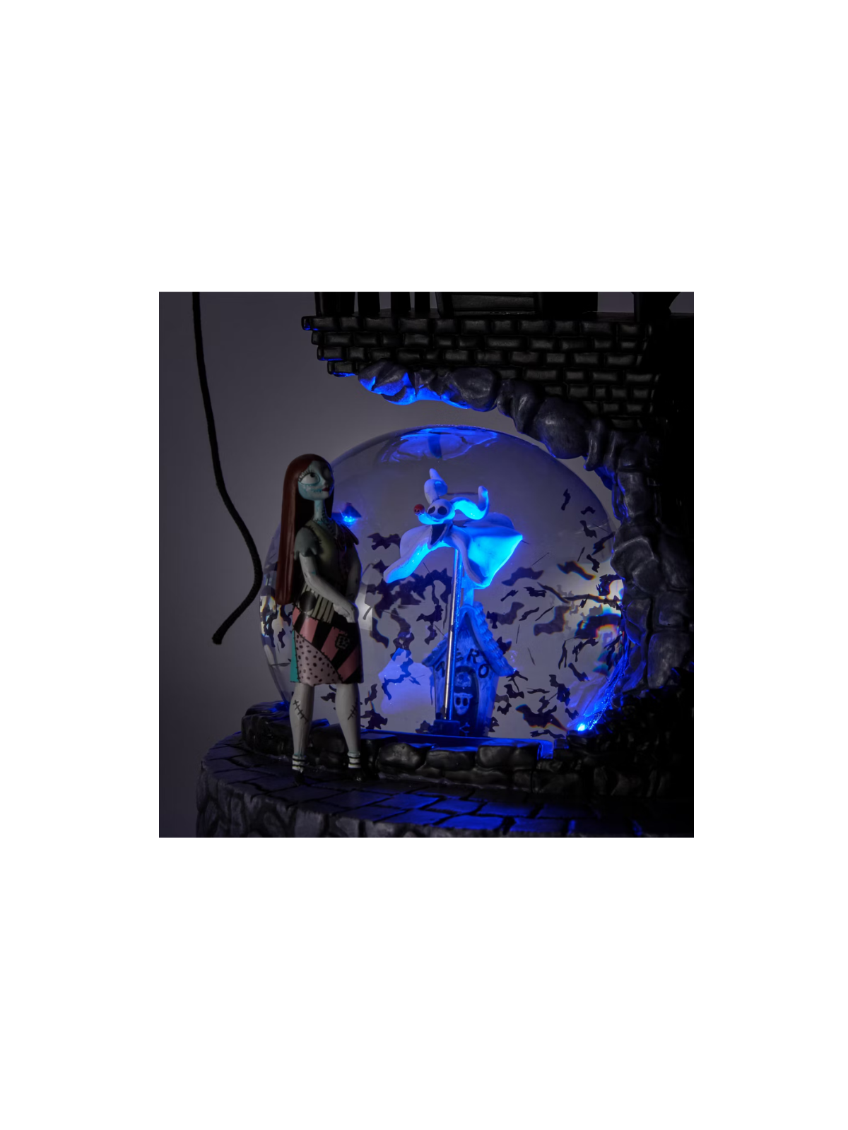 Figurine boule à neige lumineuse à paillettes L'Étrange Noël de monsieur Jack