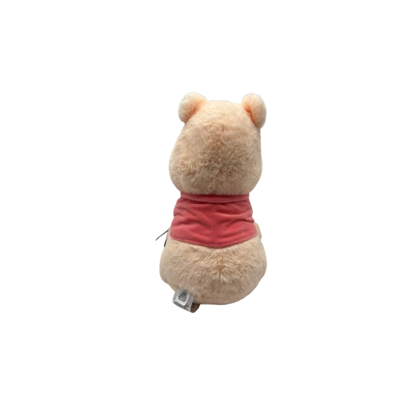 Peluche Winnie l'ourson pastel Disneyland paris